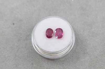 Lot 111 - TWO LOOSE OVAL CUT RUBIES, the oval cut rubies...