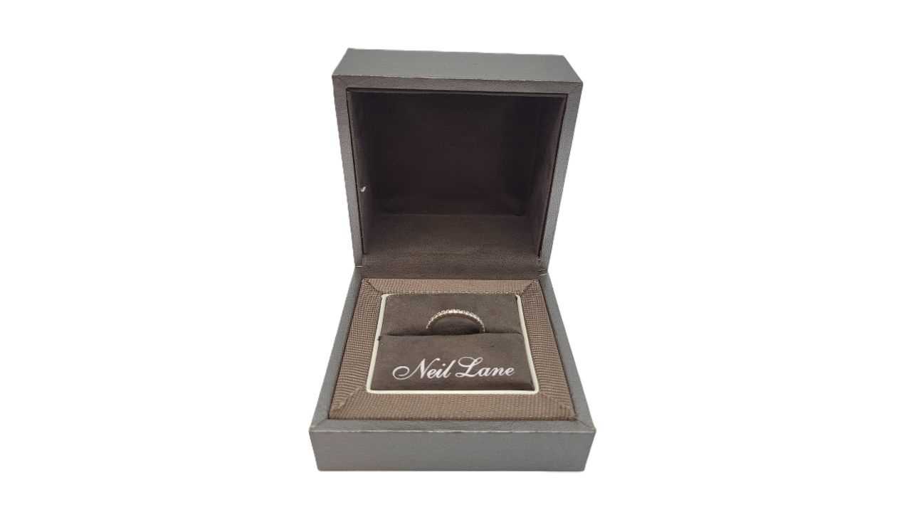 Lot 150 - A DIAMOND SET BAND RING, the wave pattern ring...