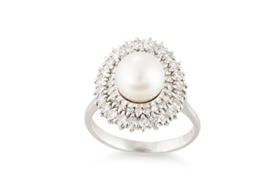 Lot 54 - A PEARL AND DIAMOND CLUSTER RING, mounted in...