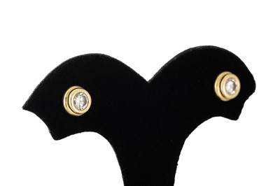 Lot 229 - A PAIR OF DIAMOND STUD EARRINGS, the brilliant...