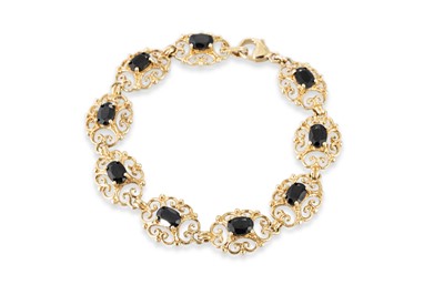Lot 344 - A SAPPHIRE BRACELET, with lobster clasp in 9ct...