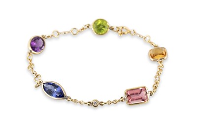 Lot 214 - A MULTI-GEM & DIAMOND SET BRACELET, the...