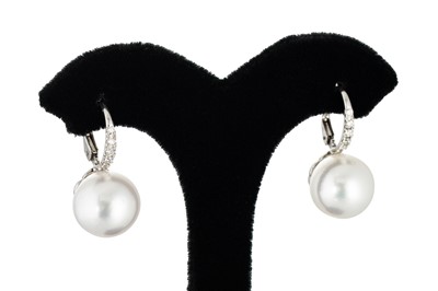 Lot 307 - A PAIR OF CULTURED SOUTH SEA PEARL AND DIAMOND...