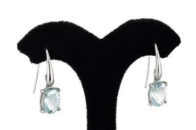 Lot 315 - A PAIR OF AQUAMARINE DROP EARRINGS, the oval...
