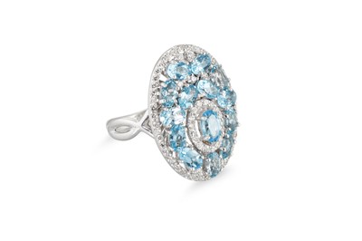 Lot 266 - A TOPAZ AND DIAMOND CLUSTER RING, set in 18ct...