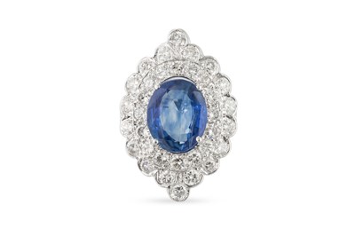 Lot 270 - A SAPPHIRE AND DIAMOND CLUSTER RING, the oval...