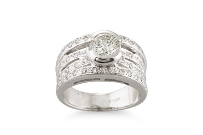 Lot 329 - A DIAMOND RING, the centre brilliant cut...