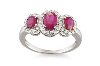 Lot 330 - A RUBY AND DIAMOND TRIPLE CLUSTER RING, the...