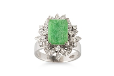 Lot 22 - A JADE AND DIAMOND RING, the tubular jade to a...