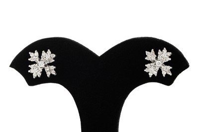 Lot 25 - A PAIR OF DIAMOND CLUSTER EARRINGS, the...