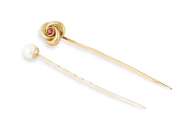 Lot 27 - TWO GOLD STICKPINS, one 9ct gold set with a...