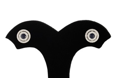Lot 97 - A PAIR OF DIAMOND AND SAPPHIRE CLUSTER...