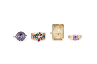 Lot 221 - FOUR GEM SET RINGS, to include: one large...