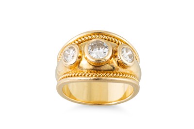 Lot 161 - A THREE STONE DIAMOND RING, the brilliant cut...
