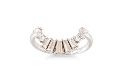 Lot 197 - A DIAMOND HALF HOOP STYLE RING, the tapered...