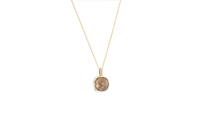 Lot 3 - A SMOKY QUARTZ AND DIAMOND PENDANT, mounted in...