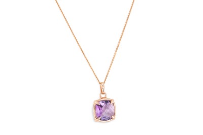 Lot 5 - AN AMETHYST SET PENDANT, mounted in 9ct gold