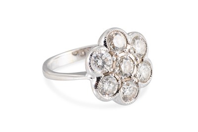 Lot 362 - A DIAMOND CLUSTER RING, of daisy form, mounted...