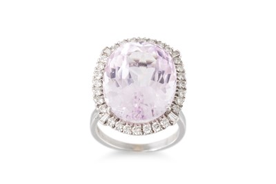 Lot 112 - A KUNZITE & DIAMOND RING, the central oval cut...
