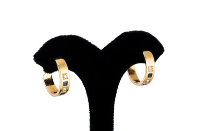 Lot 147 - A PAIR OF SAPPHIRE AND DIAMOND HALF HOOP...