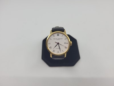 Lot 434 - A BAUME & MERCIER GENT'S 18CT GOLD AUTOMATIC...