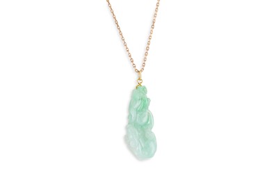 Lot 49 - A CARVED JADE PENDANT, with a 9ct gold chain &...