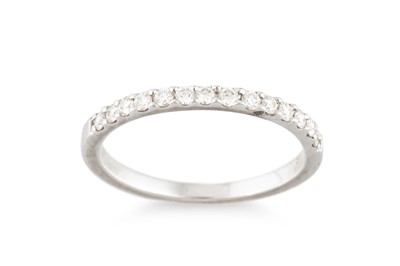 Lot 382 - A DIAMOND SET BAND RING, in 18ct white gold....