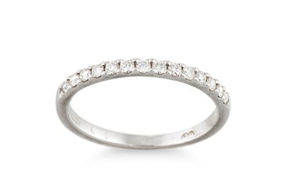 Lot 383 - A DIAMOND SET BAND RING, in 18ct white gold....
