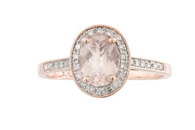 Lot 118 - A MORGANITE AND DIAMOND CLUSTER RING, set in...