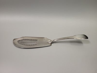 Lot 529 - A GEORGE III SILVER FISH SLICE, London 1810,...