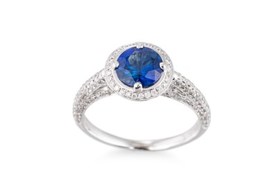 Lot 188 - A SAPPHIRE AND DIAMOND SET CLUSTER RING, the...