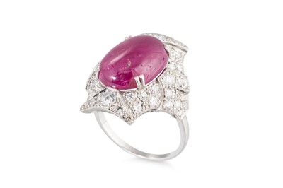 Lot 390 - A CABOCHON RUBY AND DIAMOND CLUSTER RING, of...