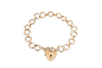 Lot 331 - A VINTAGE 9CT GOLD BRACELET, with circular...