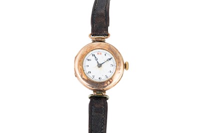 Lot 335 - AN ANTIQUE 9CT GOLD CASED WRISTWATCH, out of...