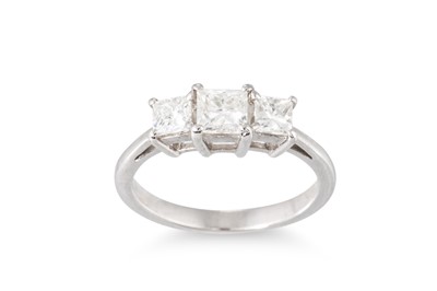Lot 345 - A THREE-STONE DIAMOND RING, the princess cut...