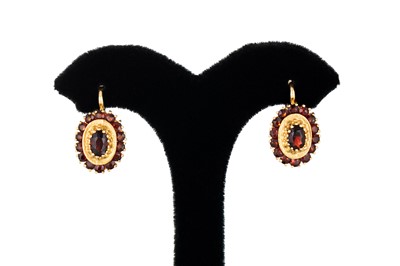 Lot 288 - A PAIR OF GARNET EARRINGS, the oval garnets to...