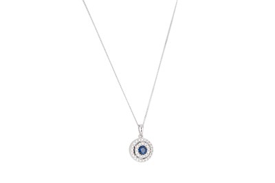 Lot 95 - A SAPPHIRE AND DIAMOND SET CLUSTER PENDANT,...