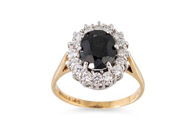 Lot 125 - A SAPPHIRE AND DIAMOND SET CLUSTER RING, the...