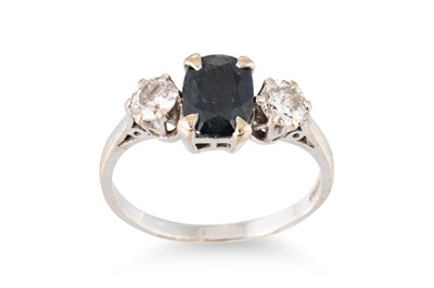 Lot 127 - A SAPPHIRE AND DIAMOND THREE STONE RING, the...