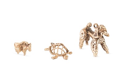 Lot 81 - THREE 9CT GOLD CHARMS, 9.77 g.