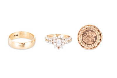Lot 137 - THREE 9CT GOLD RINGS, one set with a St....