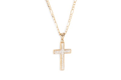 Lot 140 - A CUBIC ZIRCONIA CROSS, in 9ct gold, on a 9ct...