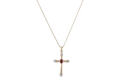 Lot 6 - A DIAMOND AND GARNET CROSS, on a 9ct yellow...