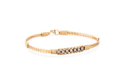 Lot 37 - A YELLOW GOLD BANGLE, 3 g., unmarked XRF...