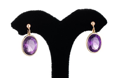 Lot 200 - A PAIR OF AMETHYST DROP EARRINGS, the oval...