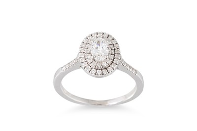 Lot 264 - A DIAMOND CLUSTER RING, the brilliant cut...