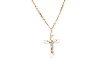 Lot 225 - A 14CT GOLD CRUICFIX, with a 14ct gold chain,...