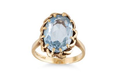Lot 231 - A  TOPAZ SET DRESS RING, mounted in 9ct yellow...