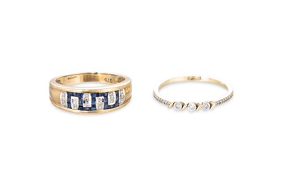Lot 93 - A SAPPHIRE AND DIAMOND SET BAND RING, the...
