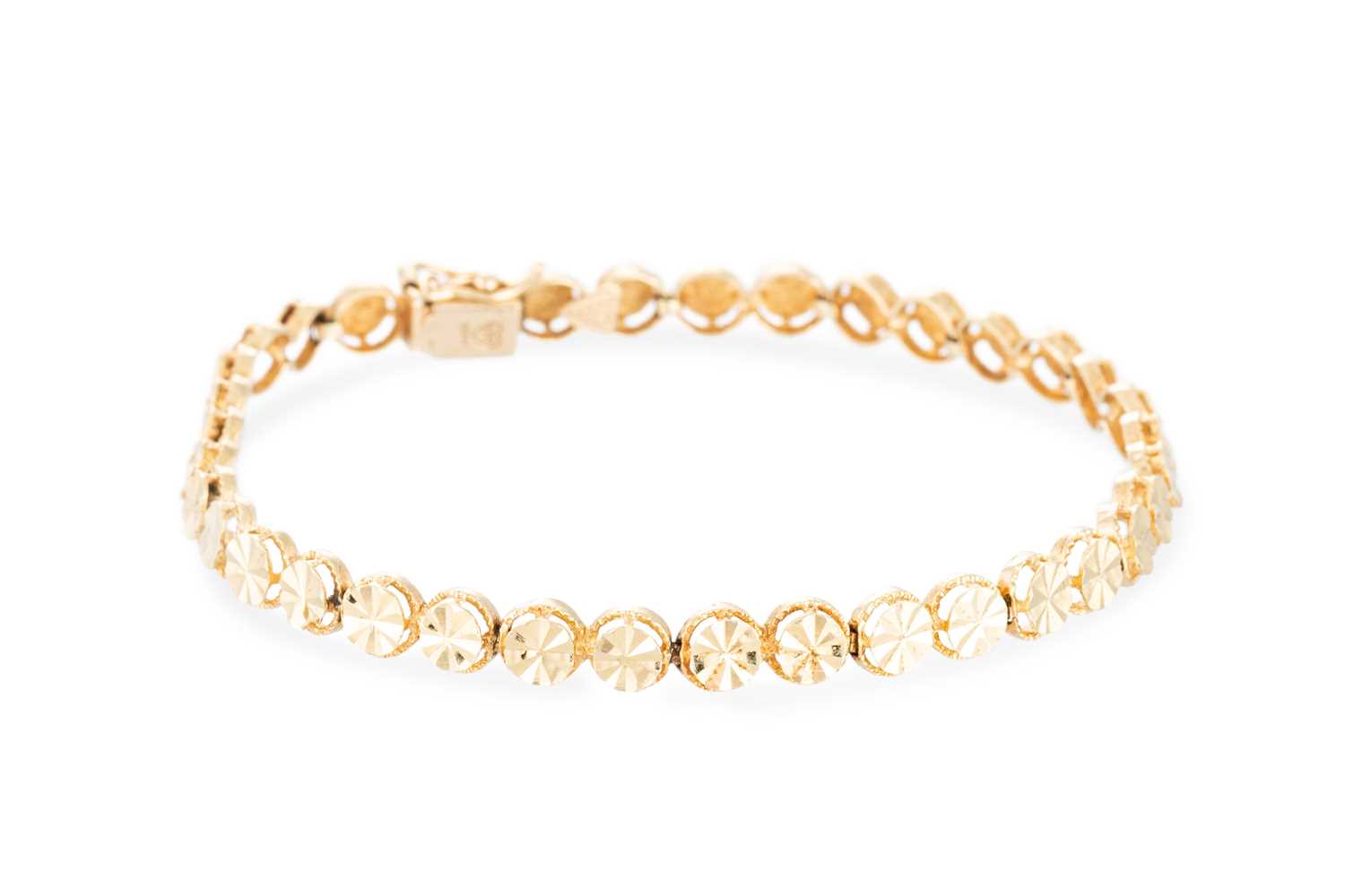 Lot 74 - A 14CT YELLOW GOLD FLEXIBLE BRACELET, stamped...